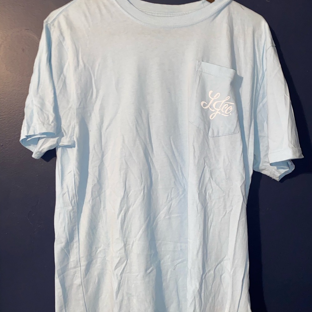 A light blue Lauren James shirt